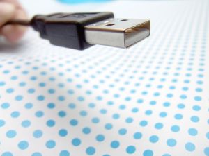 USB port on Spotted Background